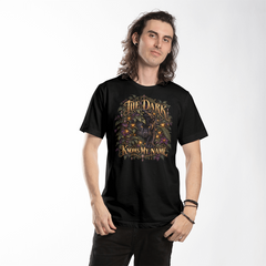 Model wearing black The Dark Knows My Name panther graphic T-shirt